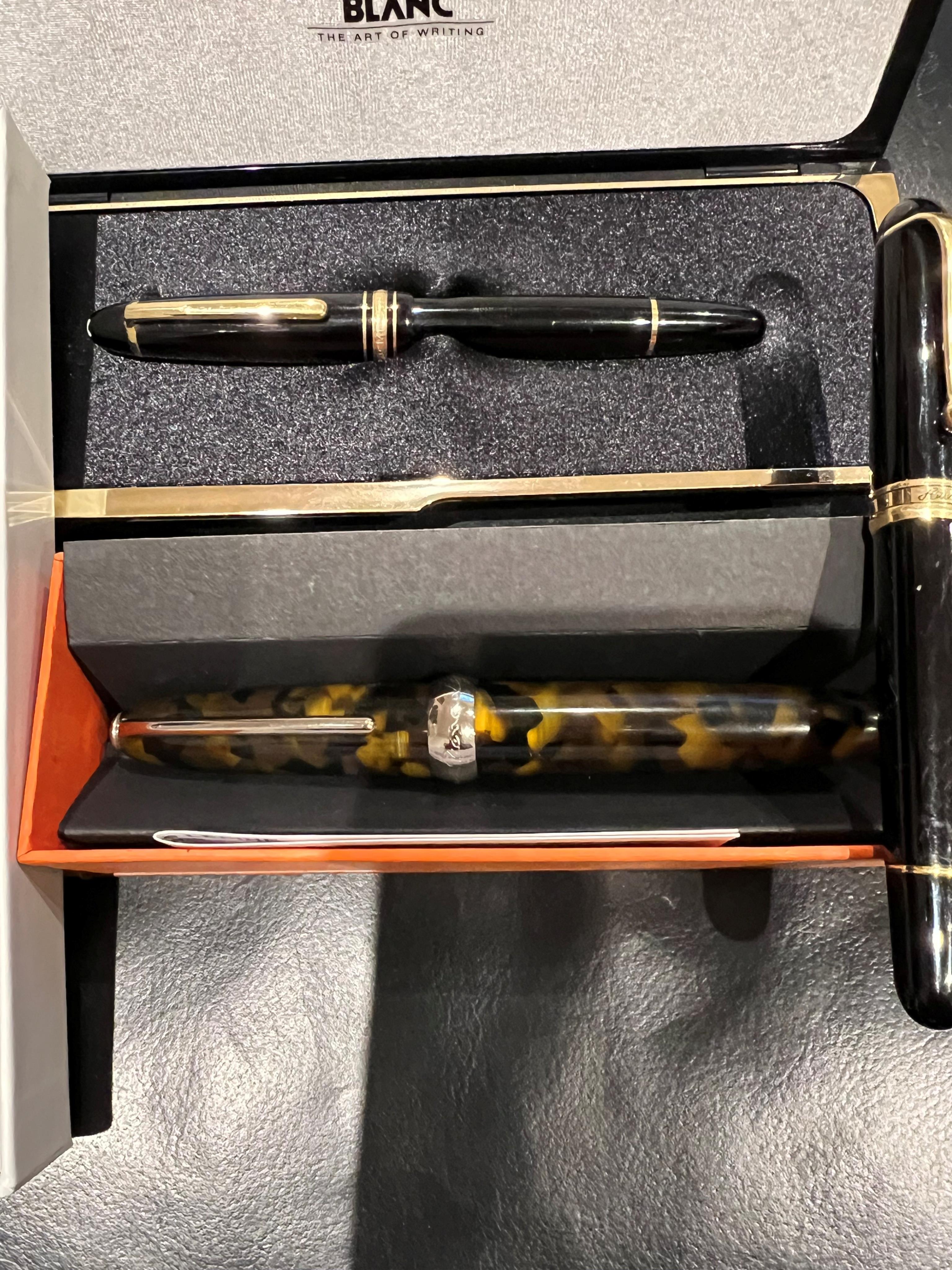 A Montblanc 146 vintage fountain pen, in original case, along with Aurora fountain pen and two others (4)